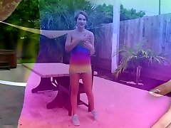 Young brunette looking like Natalie Portman is masturbating pussy by the poolside