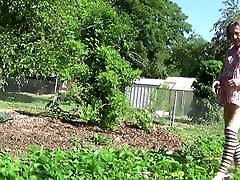 fitness muscular in the garden tasting strawberries 155