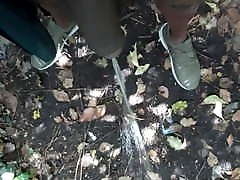 Tranny in bushes pissing