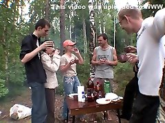 Two beautiful sluts in a camping orgy