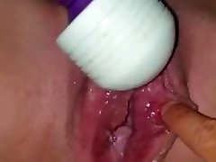 Pierced clit, squirting on husbands cock with vibrator