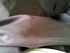 shaking bulge of grey shorts on bus
