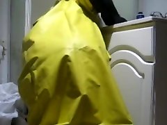 piss and cum on and in a rubber raincoat.