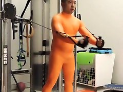 working out in full orange mommys dripping cunt suit