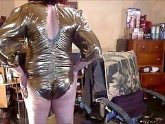Tranny model in vintage gold lame&039; bodysuit.