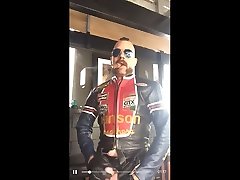 leather biker smokes a big cigar and jerks off