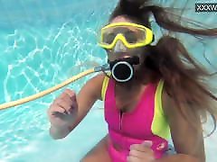 Cute teen Irina Poplavok swims naked underwater