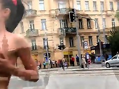 Naked Czech girl was walking through the city center