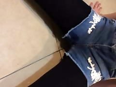 Emma pissing in her shorts , and play with her pee