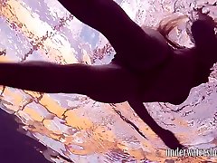 Charming slender girl flashes her impressive pubic son get ass mom underwater