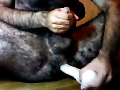 Hairy guy and his dildo