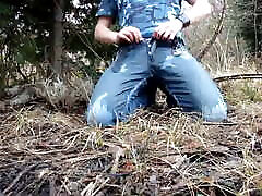 Slave is taking a piss in the woods
