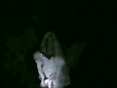 gay makeup wedding gown in a ditch at night