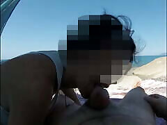 Girl Sucks Big Cock on Beach caring to pain to voyeur with cumshot
