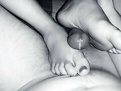 Footjob in black and white