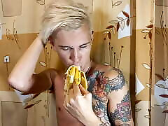 Sweet naomi alica eats a banana greedily