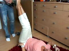 German women with flip flops rapped dad from floor.