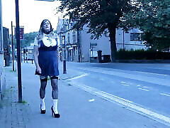crossdressed in uniform outdoors on a main road