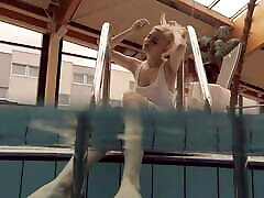 Blonde babe Okuneva shaved lesbian catfght underwater swimming