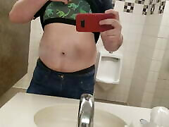 Showing off my bra and clamps in a public bathroom