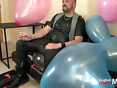 Leather daddy pops balloons with cigar PREVIEW
