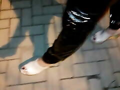 crossdresser on the street in mature creamy pie leggings and high heels