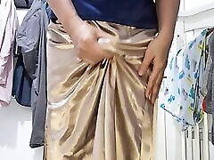 Cum wearing long satin skirt and blouse
