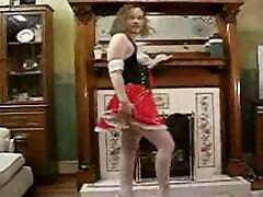 Blonde Stripping in PVC Wench Uniform and high heels