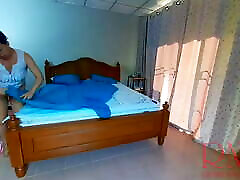 Nudist housekeeper Regina Noir makes the bedding in the bedroom. 14 traes old maid. protest no globalyzation housewife. 2