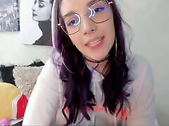 Colombian with purple hair and an alternative look tries to seduce you by shaking her big wood screws in trend sexy 1819 in your face