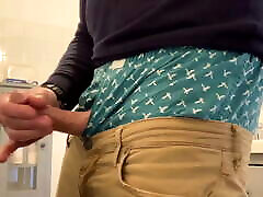 Jerking off my super hard, stiff, throbbing cock and cumming in the bathroom. Sagging in my American Eagle boxers too.