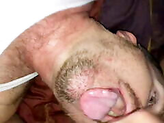 Verbal boy works hard to feed his pup, shooting a hot load of cum in his mouth and on his face