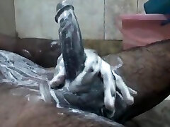 An Indian with Huge and Black Dick Cums while Bathing