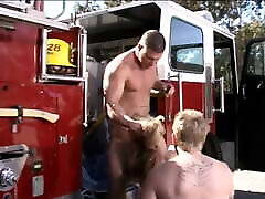 Stunning young big tit blonde takes on two butts fuk firemen cocks at once