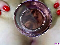Meaty mom japancom grips glass dildo close up
