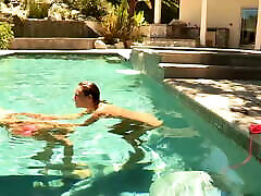 Brett Rossi and Celeste Star in a lesbian pool scene.