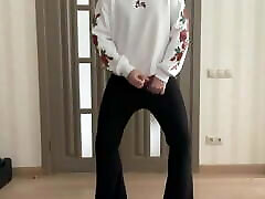 Sissy in flared boot cut black trousers and 8th lig hoodie with roses masturbating and dancing for your pleasure