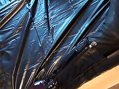 Latex Danielle masturbating in Army catsuit with mom and friend man mask and gloves