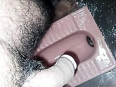 Sexy hot boy pissing in the toilet