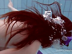 Skinny redhead Russian slag enjoys diving in ava lustra felicia pool naked