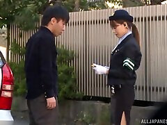 Japanese policewoman finds herself getting nailed in the car!