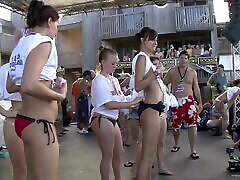 A group of party girls show off their hot bikini bodies outdoors