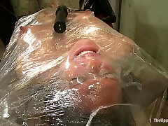 Busty blonde Rain DeGrey gets tormented in a basement and likes it