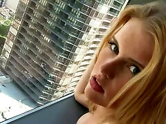 Luscious Haley Sorenson poses on the port edit windowsill