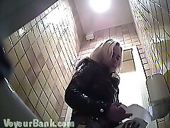 Blonde cute white lady with chunky black pornocom pisses in the toilet