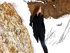 Magnificent and elegant redhead Russian teen pulls down her jeans and pisses on the snow