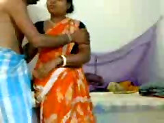 Chunky and horny amateur Indian lady riding dick of her young lover