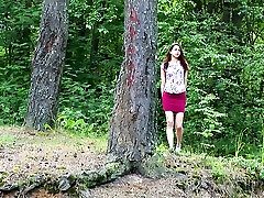Redhead magnificent teen chick in the forest squats and pisses