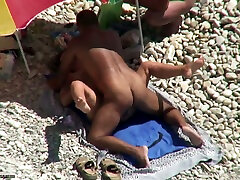 Tanned man fucks his wife on a nudist beach. very hairy body fuck video