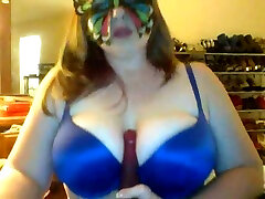 Chubby blonde wife in butterfly mask was showing off her huge boobies
